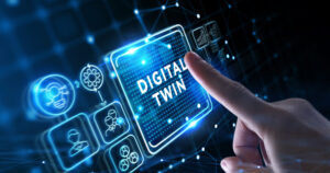 A hand selects a glowing DIGITAL TWIN button on a high-tech interface, highlighting DCIM and Digital Twins in modern data centers.